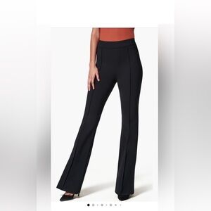 SPANX chic black flare pants with pointe fabric detail. NWOT Sz Med